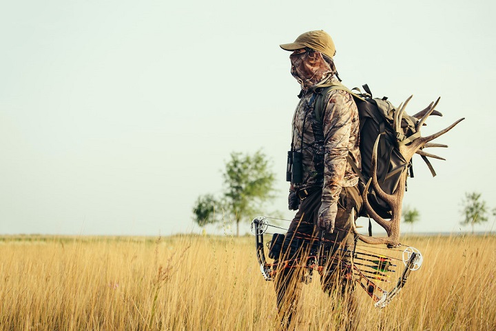 Close-up of a hunter with a bow 